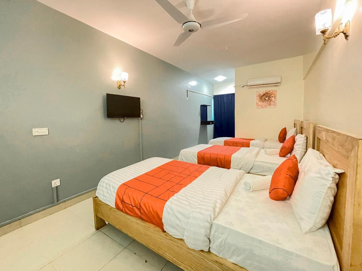 Goho Rooms 10Th Commercial Karachi Exterior photo